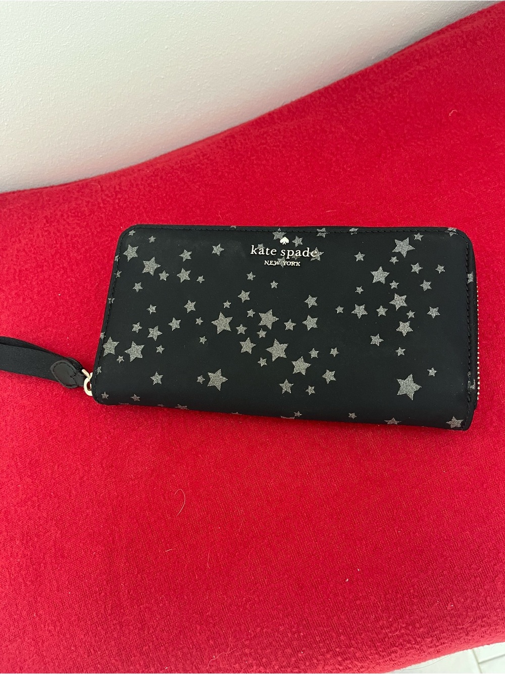 The Kate Spade Chelsea The Little Better Scattered Star Wristlet wallet